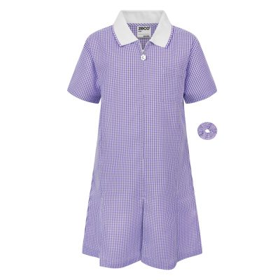 Frontal view of a purple gingham summer dress with a matching scrunchie.