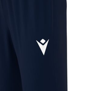 Frontal view of the Macron hero logo embroidered in white on the left thigh of the Neckar tracksuit bottoms for PE in navy.