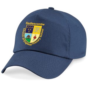 Frontal view of the Sedlescombe Primary School navy summer cap with the school's emblem printed on the front.
