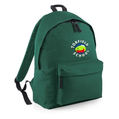 Frontal view of the Torfield School bottle green backpack with the school's emblem emboidered on the front above a zipped compartment.