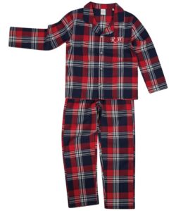 Frontal view of kids' tartan pyjamas personalised with the initials "SK" embroidered to the left breast