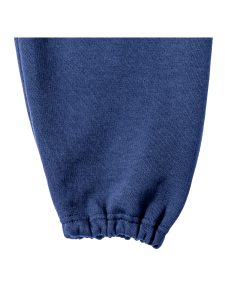 Close-up view of an elasticated leg end on on royal-blue jogging bottoms