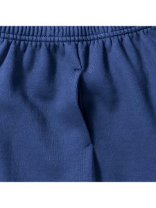 Close-up view of a side pocket on royal-blue jogging bottoms