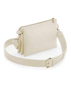 View of the Athena cross-body bag with a strap both in the cream-coloured oyster colour