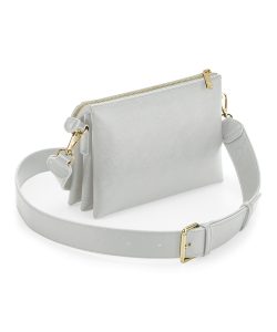 View of the Athena cross-body bag with a strap both in soft grey