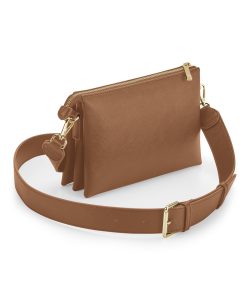 View of the Athena cross-body bag with a strap both in tan