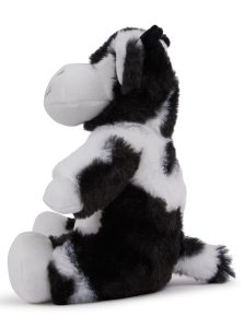 Side view of the black and white personalised "Calvin" cow teddy