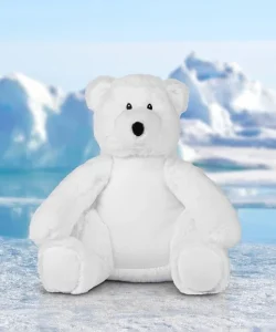Frontal view of the white polar bear teddy sat on an ice design with a background of glaciers in icy blue water