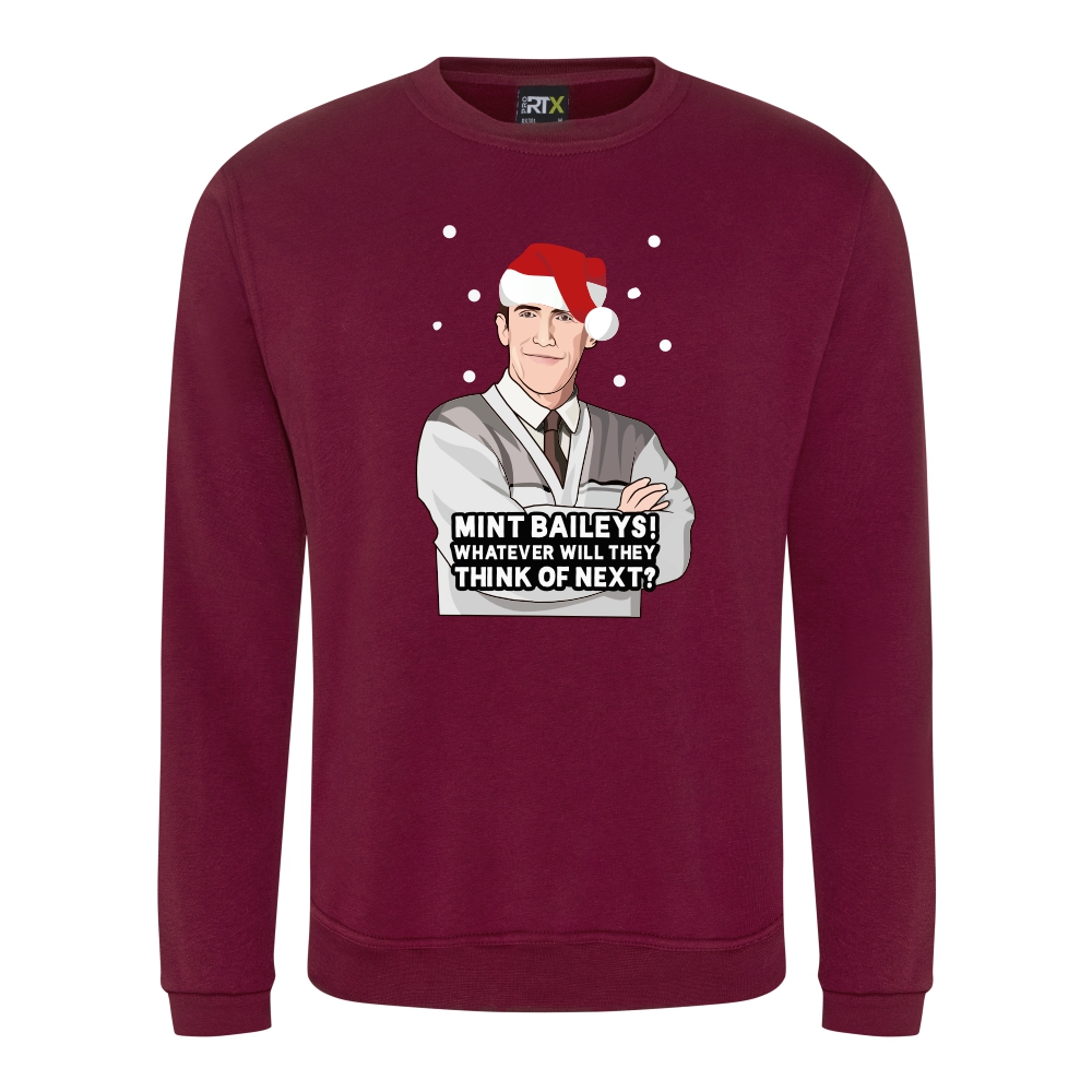 A burgundy sweatshirt with Bryn surrounded by snow and wearing a Christmas hat printed to the front. Below the face is text that reads: "Mint baileys! Whatever will they think of next?"