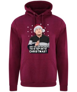 A burgundy hoodie with Smithy surrounded by snow and wearing a Christmas hat printed to the front. Below the face is text that reads: "Are you asking me to step into Christmas?"