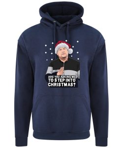 A navy hoodie with Smithy surrounded by snow and wearing a Christmas hat printed to the front. Below the face is text that reads: "Are you asking me to step into Christmas?"