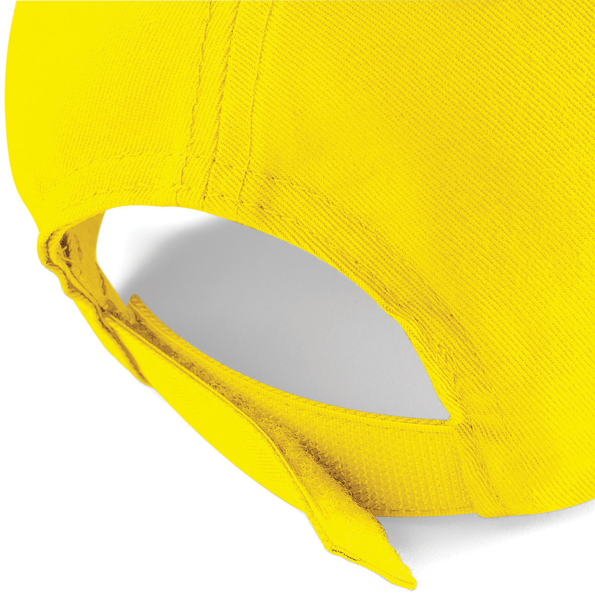 Close up view of the adjuster on the back of a yellow cap.
