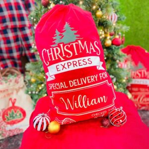 A personalised red Christmas Express sack with a custom name.