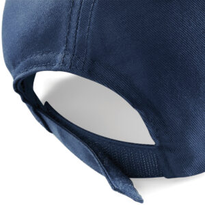 Close up view of the hook and loop closure on the back a kids navy cap.