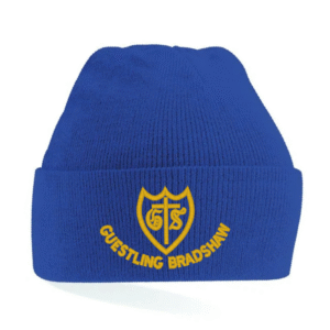 Frontal view of the Guestling Bradshaw Primary School royal blue winter beanie with the school's emblem embroidered on the front.