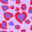 Purple and red hearts against a pink background.