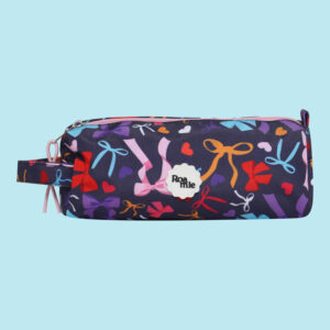In front of a sky blue background: a navy pencil case with imagery of bows of various shapes, sizes, and colours. Amongst the bows are love hearts of different colours.