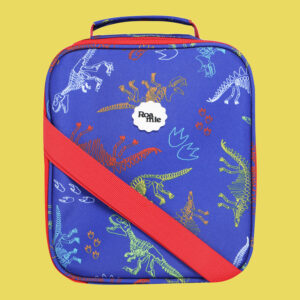 In front of a yellow background: a royal blue lunch bag with imagery of skeletal outlines of various dinosaur species in various colours amongst similar outlines of dinosaur tracks.